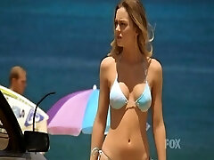 Leighton Meester climbing up a ladder out of a pool looking Leighton Meester climbing up a ladder out of a pool looking