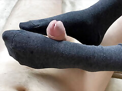 Sockjob from my girlfriend completed with cum on her feet Sockjob from my girlfriend completed with cum on her feet