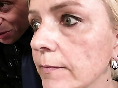 Old blonde granny takes two cocks for work