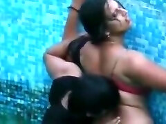 Indian aunt in pool bra and panty Indian aunt in pool bra and panty