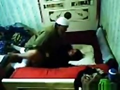 Voyeur tapes an arab hijab girl having missionary sex with a fellow on the couch