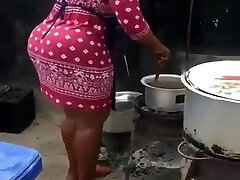 Big booty african milf cooking dinner for the family 