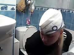Russian Chick pooping on toilet