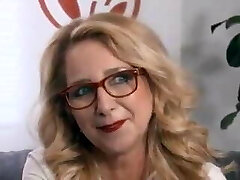 older gal in glasses gets gloppy