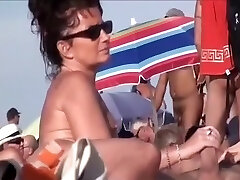 Ultra-kinky mature nudists at a beach