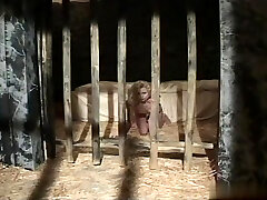 Blondie anal victim in a cage