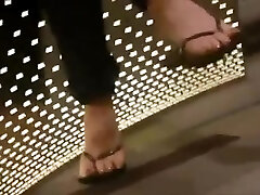 Candid Milf in flip flops feet painted toes
