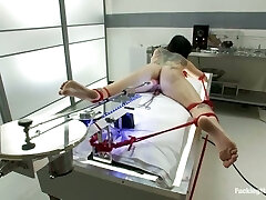 Ass siren gets bondage and drilled by a machine Ass siren gets bondage and drilled by a machine