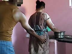 Aunty was working in the kitchen when I had lovemaking with her