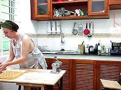 Ravioli Time! Nude Cooking. Regina Noir, a naturist cook at nudist hotel resort. Nude maid. Bare housewife. Camera 1