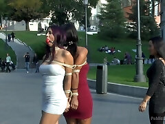 Coral Joice and Julia De Lucia strapped up in public with ball gags