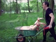 Youthful slave get tied up and boinked in the garden
