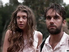 Elena Koshka offers her puss for some food