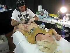 Blonde ditzy screams with pain as her pubis was being tattooed