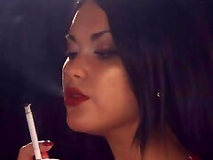 Asha chain smoking all white 100s menthol cigarettes