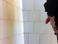 Guy Pissing In Old Douche Stall