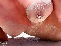 Wifey sits topless on the public beach with her perfect tits out