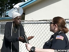 Two whorish police officers take advantage over black scofflaw