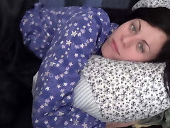 Sleepy Girlfriend in Pajamas Playing with Puffies