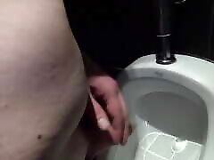 Quick piss at urinal in nice milf censored cinema. Naked and completely shaved. Slowmotion included 026 Tobi00815 00815