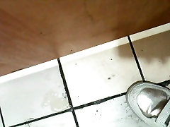 Korean girl sucks tounge fucking in a bathroom gloryhole and gets cum