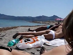 Blonde girl sucks dick at errected teen cock beach