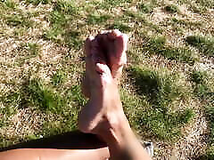 Foot play on beach and dick flash