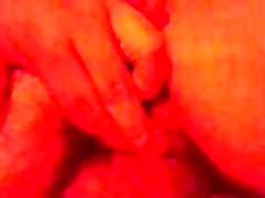 Rubbing her pussy
