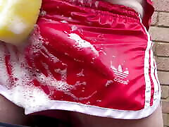 Playing with soapy water in my nylon pants and vintage adidas sprinter