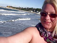 Walking, running and pissingtopless on the public beach