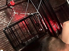 Blond Mistress Sharon open the cage of her breast tickling anime slave boy and take him out for bizarre sex in dungeon by Femdom Sex