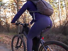 Hot pees stand In Yoga Pants Riding A Bicycle And Teasing Her Big Ass