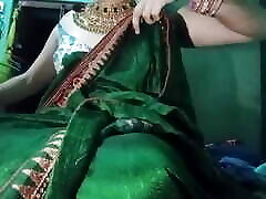 Indian Gay Crossdresser Gaurisissy pressing his boobs so hard and enjoying in green Saree