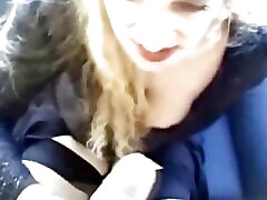 Mature blonde blowing cock at home