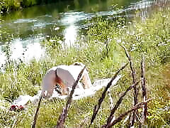 Nude Milf sunbathing on river bank. Random guy watching. Wild beach. Nudist beach. Naked in public. Doggystyle. Ass. Pussy. POV
