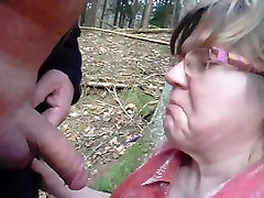 granny sucks her husband in the forest