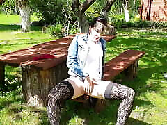 Wanking in stocking beneath the shady apple trees.