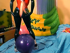 Latex kigurumi popping latex balloon
