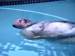 Santa relaxes in the pool