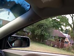 Black slut sucking doct tube in front seat of car