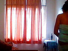 my new Indian maid cleaning my room