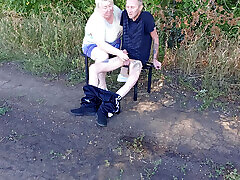 Stepmom sucks my dick in a public park on a bench until I cum