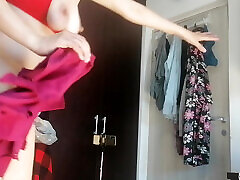 Sexy Latina Having Fun Trying on Clothes and Cutting Them