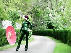 Beautiful girl modelling green catsuit