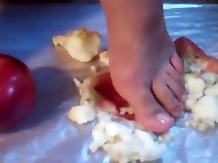 Young babe crush apple with Hot FEET Young babe crush apple with Hot FEET