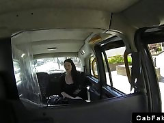 Dark hair amateur blowjob in fake taxi