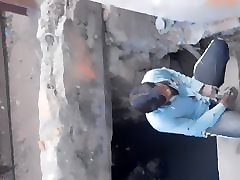 spying indian man peeing near road