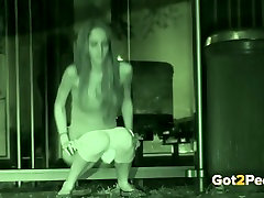 Long haired skinny sex doll pisses outdoors at late night