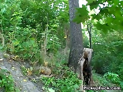 Nasty blond chick is sucking cock in a the woods