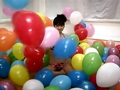 caught pantie Asian girlie Yuko Ogura shows her body and plays with balloons